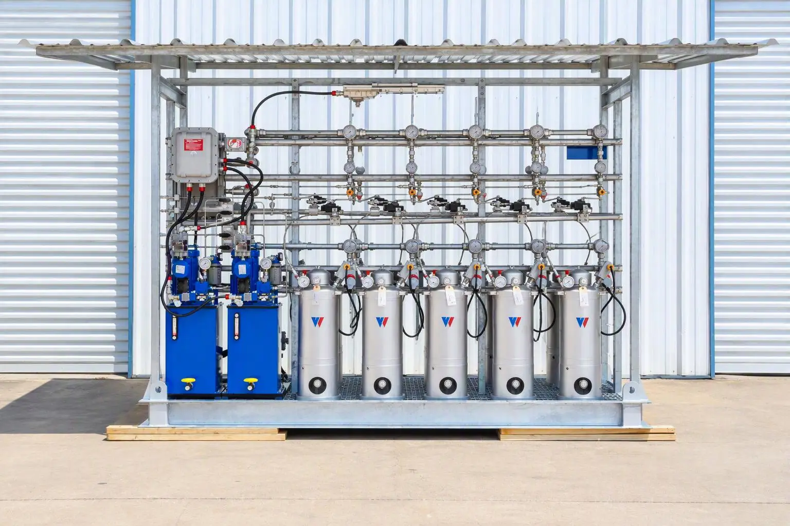 crude oil sampling skid with canopy, dual hydraulic units, and ten sample containers